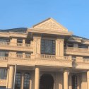 中山黄金麻别墅外墙干挂石材效果示例