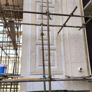 中山 黄金麻花岗岩别墅外墙干挂回纹造型效果