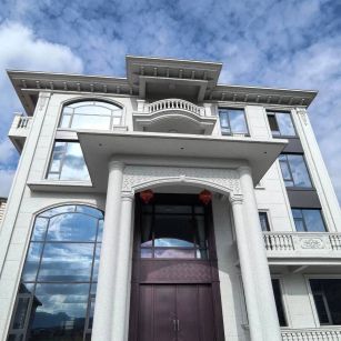 中山白麻别墅外墙干挂石材效果示例