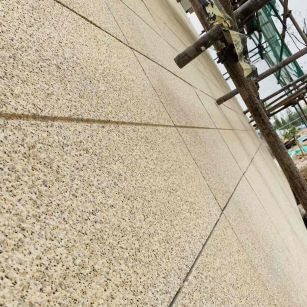 中山 黄金麻花岗岩荔枝面外墙干挂石材效果示例