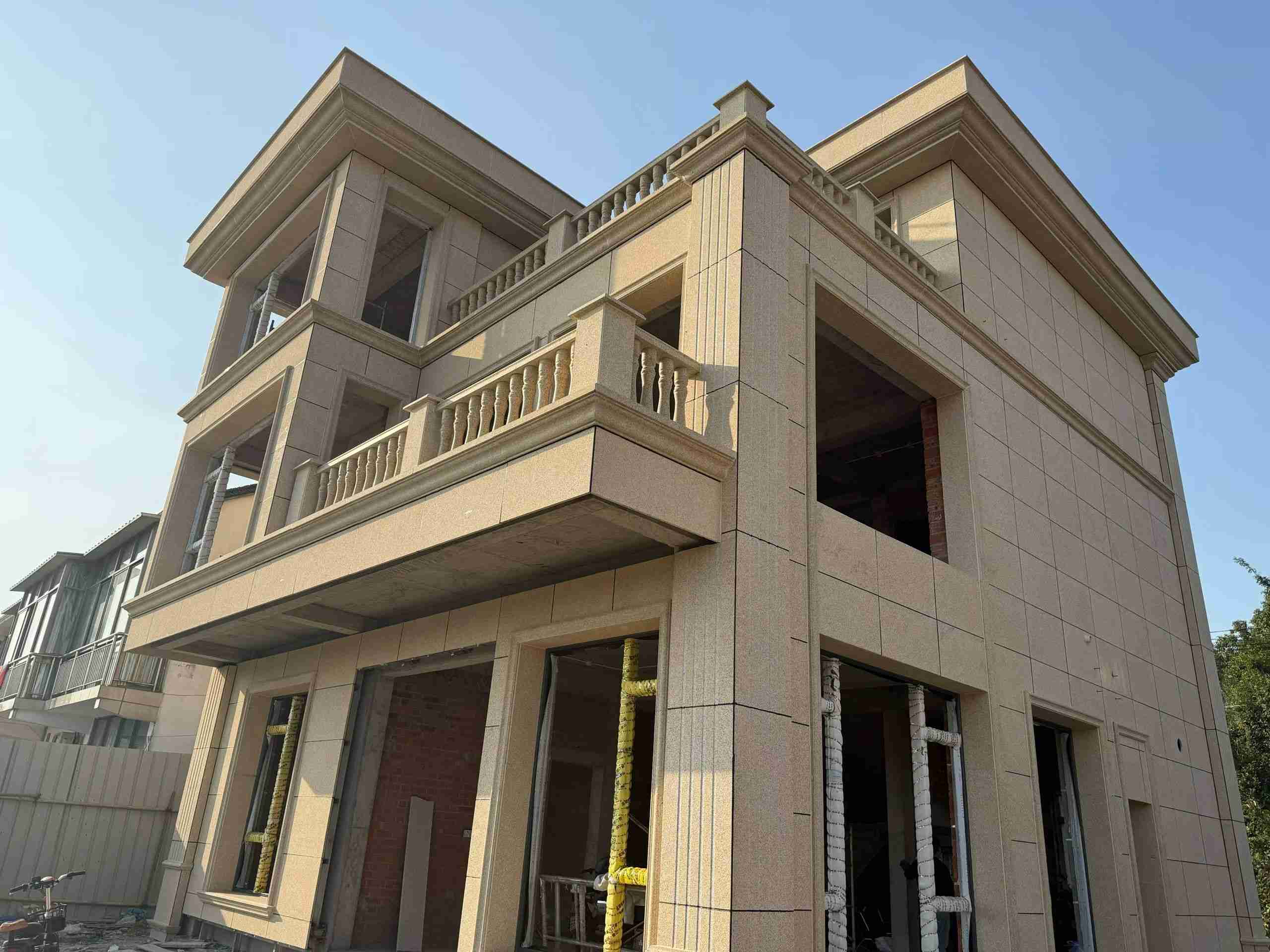 中山 黄金麻花岗岩石材荔枝面外墙干挂效果展示