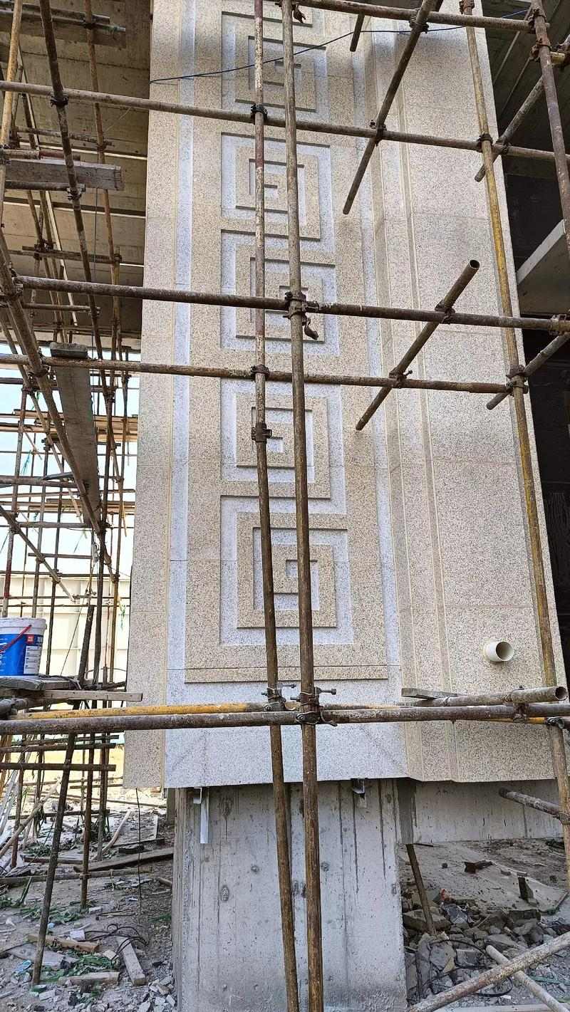 中山 黄金麻花岗岩别墅外墙干挂回纹造型效果